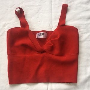 Seek the label crop top